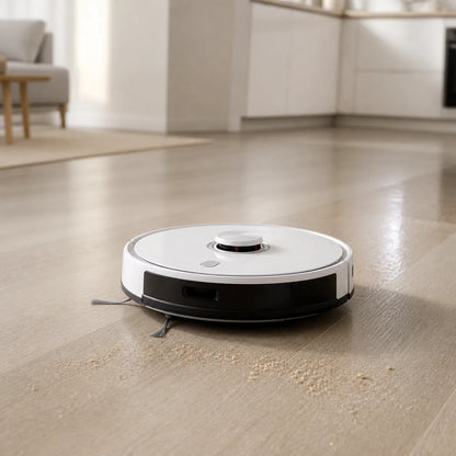 AI robot vacuum and mop collecting crumbs and leaving a clean wiped path on a hard floor